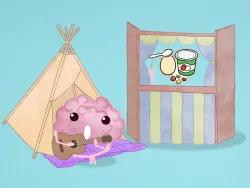 Brainy sitzt vor einem Zelt, spielt Gitarre und singt