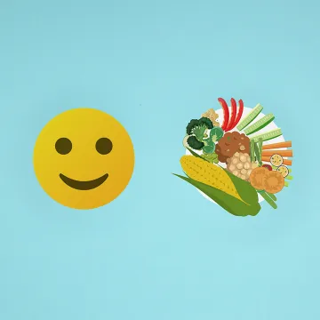 Lachender Smiley und Teller mit Gemüse und Obst vor blauem Hintergrund